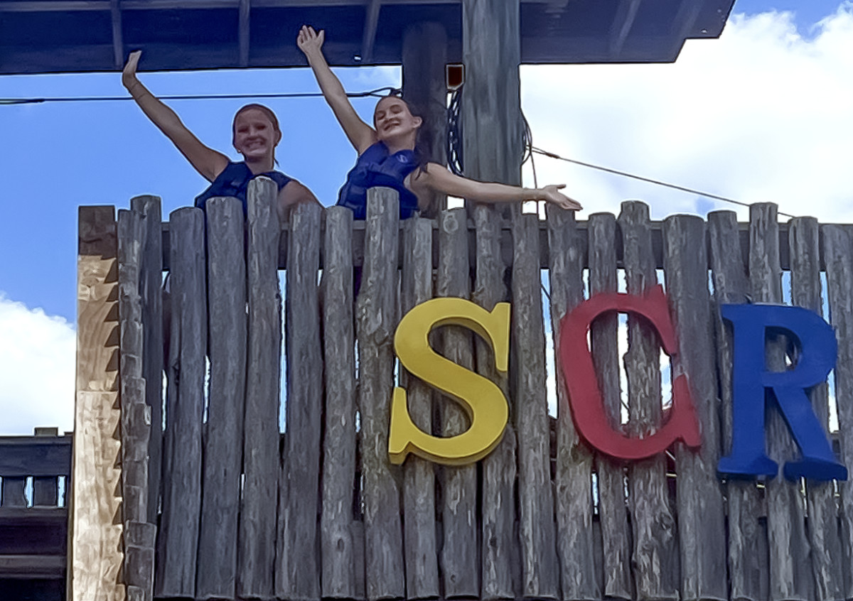 At the freshman retreat, freshmen Julia Iglesias and Annie Fertitta pose behind the Stoney Creek Ranch sign, getting ready to take an exhilarating ride down the zipline. “The zipline was my favorite activity of the freshman retreat,” freshman Annie Fertitta said. Although students weren’t able to spend the night at the ranch, they were still able to make many new memories and form lifelong friendships. 